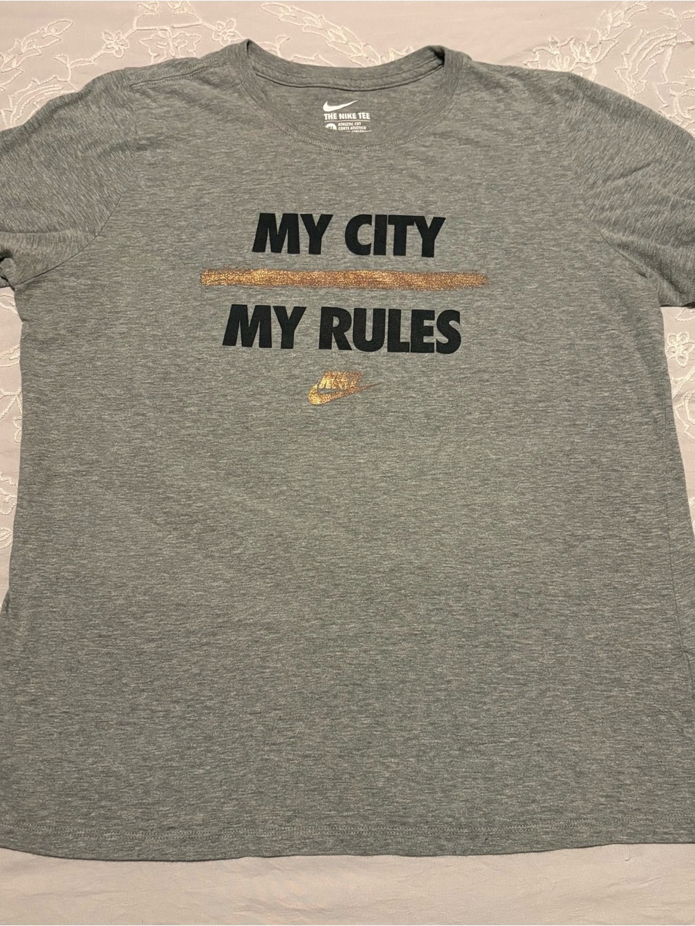 Nike Grey 'My City My Rules' Short Sleeve Graphic Tee with Gold Accent